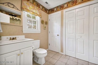 Impeccably maintained brick home positioned on the 8th fairway on Beau Rivage Golf and Resort in North Carolina - for sale on GolfHomes.com, golf home, golf lot