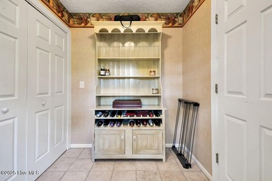 Impeccably maintained brick home positioned on the 8th fairway on Beau Rivage Golf and Resort in North Carolina - for sale on GolfHomes.com, golf home, golf lot