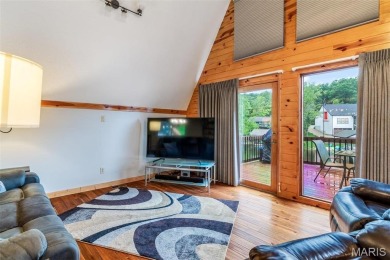 Welcome to your dream Lodge-like home nestled on a sprawling on Raintree Country Club in Missouri - for sale on GolfHomes.com, golf home, golf lot