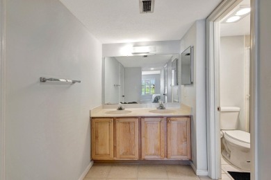 2/2 condo with great golf course view.  Ground floor convenience on Ocean Village Golf Course in Florida - for sale on GolfHomes.com, golf home, golf lot