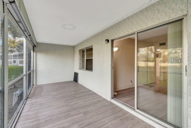 Seller Motivated! This 2 bed, 1.5 bath, ground floor condo in on Hillsboro Pines Golf in Florida - for sale on GolfHomes.com, golf home, golf lot