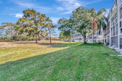 Seller Motivated! This 2 bed, 1.5 bath, ground floor condo in on Hillsboro Pines Golf in Florida - for sale on GolfHomes.com, golf home, golf lot