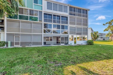Seller Motivated! This 2 bed, 1.5 bath, ground floor condo in on Hillsboro Pines Golf in Florida - for sale on GolfHomes.com, golf home, golf lot