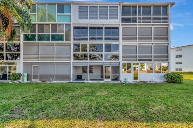 Seller Motivated! This 2 bed, 1.5 bath, ground floor condo in on Hillsboro Pines Golf in Florida - for sale on GolfHomes.com, golf home, golf lot