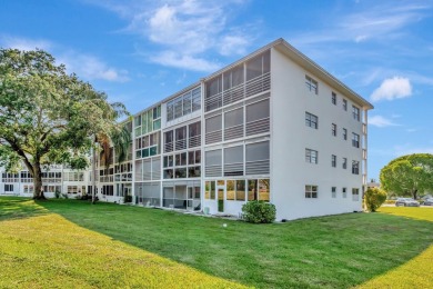 Seller Motivated! This 2 bed, 1.5 bath, ground floor condo in on Hillsboro Pines Golf in Florida - for sale on GolfHomes.com, golf home, golf lot