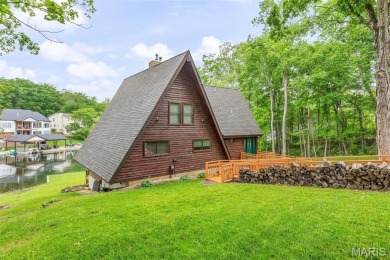 Welcome to your dream Lodge-like home nestled on a sprawling on Raintree Country Club in Missouri - for sale on GolfHomes.com, golf home, golf lot