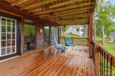 Welcome to your dream Lodge-like home nestled on a sprawling on Raintree Country Club in Missouri - for sale on GolfHomes.com, golf home, golf lot