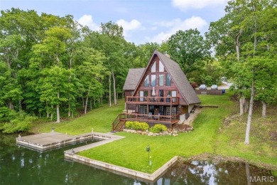 Welcome to your dream Lodge-like home nestled on a sprawling on Raintree Country Club in Missouri - for sale on GolfHomes.com, golf home, golf lot