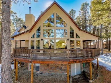Incredibly beautiful custom home located on the highly manicured on Angel Fire Resort Country Club in New Mexico - for sale on GolfHomes.com, golf home, golf lot