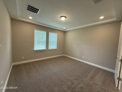Introducing a brand-new, energy-efficient home available for on LPGA International Golf Course in Florida - for sale on GolfHomes.com, golf home, golf lot