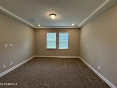 Introducing a brand-new, energy-efficient home available for on LPGA International Golf Course in Florida - for sale on GolfHomes.com, golf home, golf lot