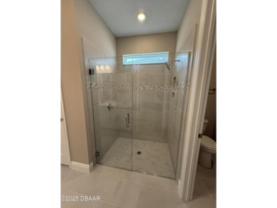Introducing a brand-new, energy-efficient home available for on LPGA International Golf Course in Florida - for sale on GolfHomes.com, golf home, golf lot