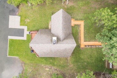 Welcome to your dream Lodge-like home nestled on a sprawling on Raintree Country Club in Missouri - for sale on GolfHomes.com, golf home, golf lot