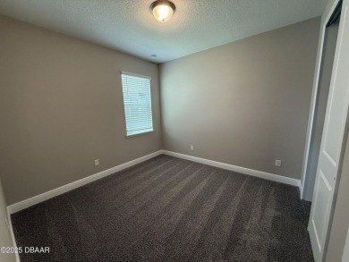 Introducing a brand-new, energy-efficient home available for on LPGA International Golf Course in Florida - for sale on GolfHomes.com, golf home, golf lot