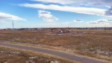 The captivating vistas of the Desert Hawk Golf Course serve as a on Desert Hawk At Pueblo West in Colorado - for sale on GolfHomes.com, golf home, golf lot