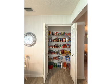 Welcome to this move in ready Expanded Philadelphian Model Villa on On Top of the World Golf Course in Florida - for sale on GolfHomes.com, golf home, golf lot