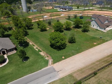 Welcome to beautiful Pecan Plantation. This large one of a kind on Pecan Plantation Country Club in Texas - for sale on GolfHomes.com, golf home, golf lot
