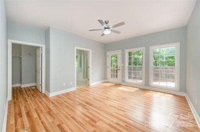 Why just live near the lake when you can live on it? This on Tega Cay Golf Club in South Carolina - for sale on GolfHomes.com, golf home, golf lot
