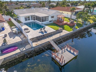 Experience the ultimate Gulf Harbors waterfront lifestyle in on Gulf Harbors Golf Course in Florida - for sale on GolfHomes.com, golf home, golf lot