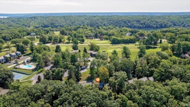 Welcome to your new retreat! Located near picturesque Lake on The Eagle Pointe Golf Resort in Indiana - for sale on GolfHomes.com, golf home, golf lot