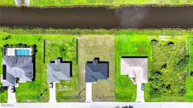 BRAND NEW CONSTRUCTION ON A FRESHWATER CANAL LOT WITH A GREAT on Mirror Lakes Golf Club in Florida - for sale on GolfHomes.com, golf home, golf lot