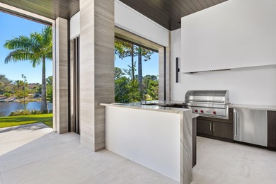 Set within the prestigious gates of The Bears Club, 228 Bears on The Bears Club in Florida - for sale on GolfHomes.com, golf home, golf lot