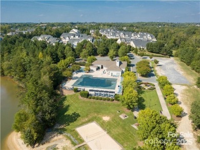 Why just live near the lake when you can live on it? This on Tega Cay Golf Club in South Carolina - for sale on GolfHomes.com, golf home, golf lot