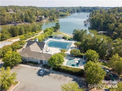 Why just live near the lake when you can live on it? This on Tega Cay Golf Club in South Carolina - for sale on GolfHomes.com, golf home, golf lot