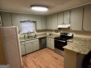 Great house with 4 bedrooms and 2 baths on a double lot in the on Golf Club of Macon in Georgia - for sale on GolfHomes.com, golf home, golf lot