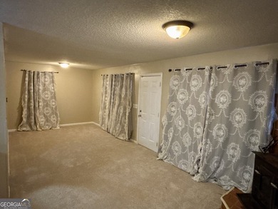 Great house with 4 bedrooms and 2 baths on a double lot in the on Golf Club of Macon in Georgia - for sale on GolfHomes.com, golf home, golf lot