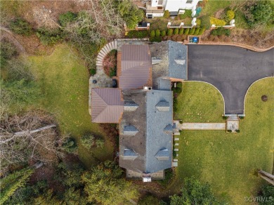 This charming brick and slate English Revival home has on Country Club of VA - Westhampton in Virginia - for sale on GolfHomes.com, golf home, golf lot