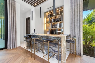 Set within the prestigious gates of The Bears Club, 228 Bears on The Bears Club in Florida - for sale on GolfHomes.com, golf home, golf lot