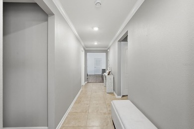 Step into pristine, easy-living perfection in Savona North with on Venetian Bay Golf Course in Florida - for sale on GolfHomes.com, golf home, golf lot