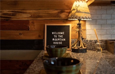 Welcome to this stunningly remodeled, fully furnished 4-bedroom on Seven Springs Mountain Resort in Pennsylvania - for sale on GolfHomes.com, golf home, golf lot