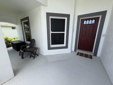 This Johnson-built block home is move in ready, located in the on Turnbull Bay Golf Club in Florida - for sale on GolfHomes.com, golf home, golf lot
