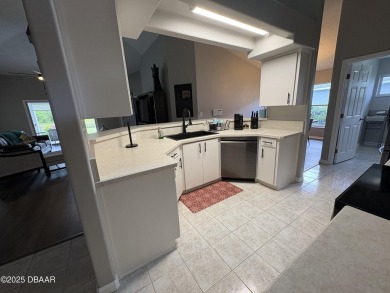 This Johnson-built block home is move in ready, located in the on Turnbull Bay Golf Club in Florida - for sale on GolfHomes.com, golf home, golf lot