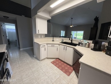This Johnson-built block home is move in ready, located in the on Turnbull Bay Golf Club in Florida - for sale on GolfHomes.com, golf home, golf lot