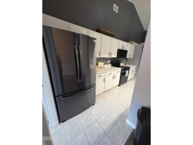 This Johnson-built block home is move in ready, located in the on Turnbull Bay Golf Club in Florida - for sale on GolfHomes.com, golf home, golf lot