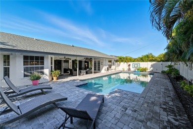 Paradise Found! Stunning Pool Home in SW Cape Coral - All on Palmetto-Pine Country Club in Florida - for sale on GolfHomes.com, golf home, golf lot