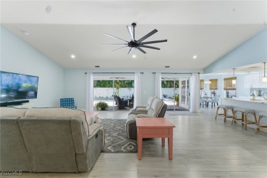 Paradise Found! Stunning Pool Home in SW Cape Coral - All on Palmetto-Pine Country Club in Florida - for sale on GolfHomes.com, golf home, golf lot