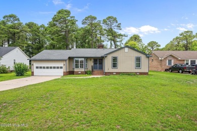 Welcome home to 1403 Santa Lucia rd in the sought after commnity on Harbour Point Golf Club in North Carolina - for sale on GolfHomes.com, golf home, golf lot