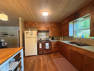 Wonderful lake front home in the piney woods of East Texas on Pine Dunes Golf Course in Texas - for sale on GolfHomes.com, golf home, golf lot