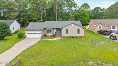 Welcome home to 1403 Santa Lucia rd in the sought after commnity on Harbour Point Golf Club in North Carolina - for sale on GolfHomes.com, golf home, golf lot