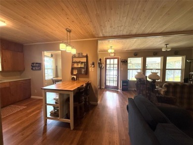 Wonderful lake front home in the piney woods of East Texas on Pine Dunes Golf Course in Texas - for sale on GolfHomes.com, golf home, golf lot
