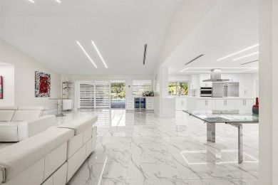 Stunning remodeled 4BR, 3.5BA home with breathtaking golf views on  in Florida - for sale on GolfHomes.com, golf home, golf lot