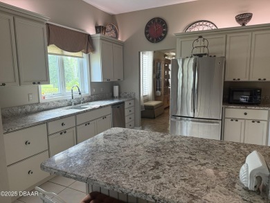 ~ New TILE roof in 2019
~ HVAC upgrade 2019
~ Entire kitchen on Plantation Bay Golf and Country Club in Florida - for sale on GolfHomes.com, golf home, golf lot