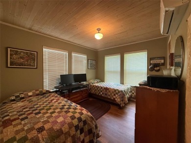 Wonderful lake front home in the piney woods of East Texas on Pine Dunes Golf Course in Texas - for sale on GolfHomes.com, golf home, golf lot