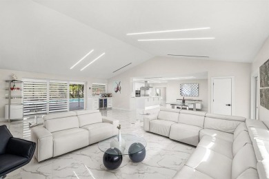 Stunning remodeled 4BR, 3.5BA home with breathtaking golf views on  in Florida - for sale on GolfHomes.com, golf home, golf lot