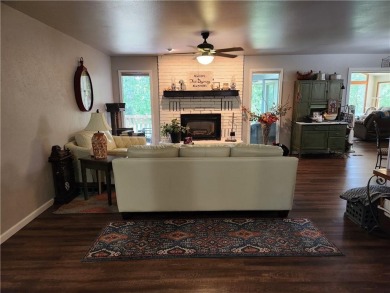 Love mountain biking, golfing, swimming? Less than one mile to on Bella Vista Country Club - Berksdale in Arkansas - for sale on GolfHomes.com, golf home, golf lot