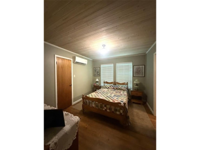 Wonderful lake front home in the piney woods of East Texas on Pine Dunes Golf Course in Texas - for sale on GolfHomes.com, golf home, golf lot